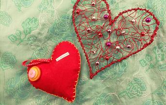 2 different crafted hearts