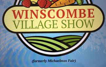 Poster about the show with a lilac background and stylised drawings of fruit and veg