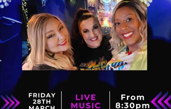 The three female band members of Encore - a vocal harmony group