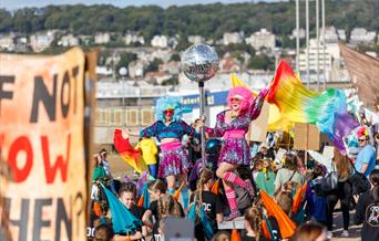 Bright photographs of carnival participants in costume.