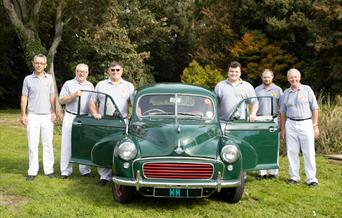 Morris Minor standing with a classic Morris Minor car