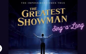 The Greatest Showman Sing-a-Long poster with an individual standing underneath a spotlight.