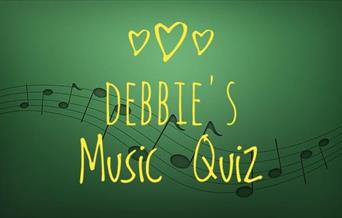 Green poster with information about pub quiz