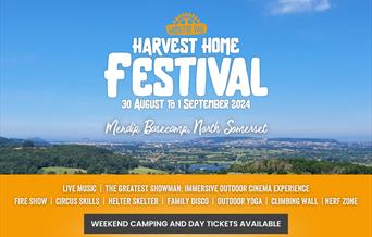 Landscape view from the Mendip Hills over to the coast. Harvest Home Festival logo in centre of image with text highlighting location at Mendip Baseca