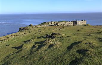 A disused World World Two fort at the end of a coastal peninsula.