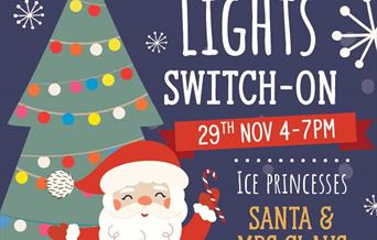 Poster featuring a Santa Claus and a Christmas tree promoting a Christmas lights switch on