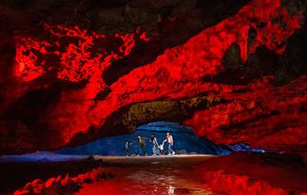 Summer memories made at Wookey Hole - photograph of the caves with red lights.