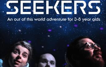 Photograph of star seekers with lots of stars in the background.