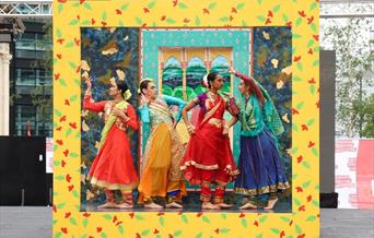 Group of South Asian ladies dancing