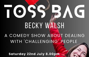 Tossbag - photograph of Becky in a red jacket, throwing a red paper bag into the air.