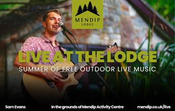 Sam Evans (musican) playing on guitar and singing into microphone. Mendip Lodge logo. Text promotes Live at the Lodge: Summer of free outdoor live mus