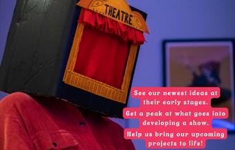 Theatre Lab poster of a person wearing a theatre hat.