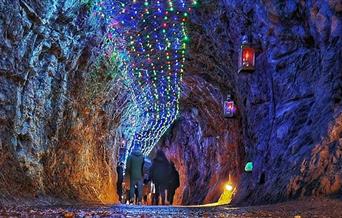 Cave illuminated with fairy lights