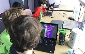 Children coding in Minecraft Education