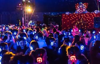 image of bright silent disco, with headphones