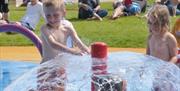 Children playing in a water park