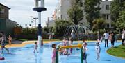 Young children playing in a waterpark