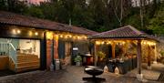 A luxury outside dining area and courtyard at Webbington Farm Holiday Cottages near Weston-super-Mare