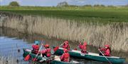 Two canoes on the river