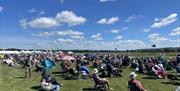 Crowds enjoying the model display