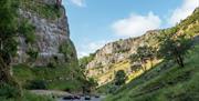 A mountain road slicing through a gorge