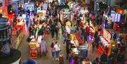 Crowds in the amusements section of the Grand Pier