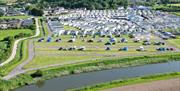 Aerial View of the Riverside Holiday Village at Weston-super-Mare with a river running through it