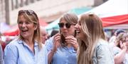 Happy people at an eat:Festivals event