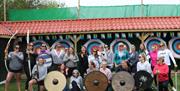 Wall Eden Farm Adventure Holidays Self Catering Visit Weston-super-Mare  group photograph archery shields