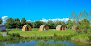 Wall Eden Farm Adventure Holidays Self Catering Visit Weston-super-Mare pod exterior river blue sky