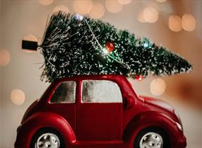 Red VW beetle with Xmas Tree