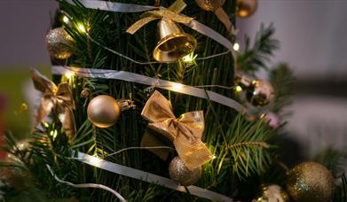 Gold decorations on a Christmas tree