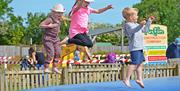Children enjoying the trampolines at Puxton Park