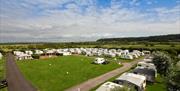 Country View Holiday Park Sand Bay view of parked tourers