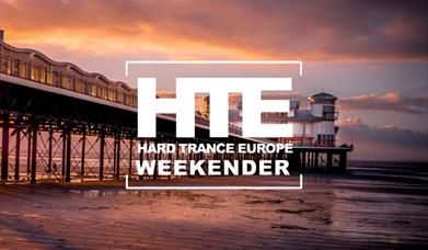 Image of a pier with text advertising a music weekend super-imposed on it