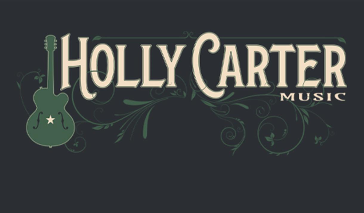 The name Holly Carter written on a blank background