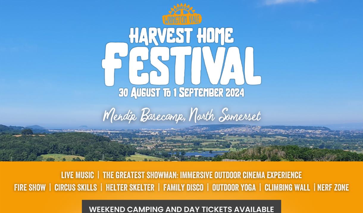 Landscape view from the Mendip Hills over to the coast. Harvest Home Festival logo in centre of image with text highlighting location at Mendip Baseca
