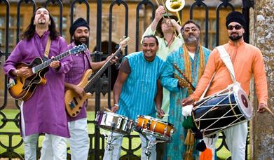 A six piece Bhangra band