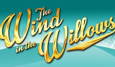 The Wind in the Willows wording on a pale green background.