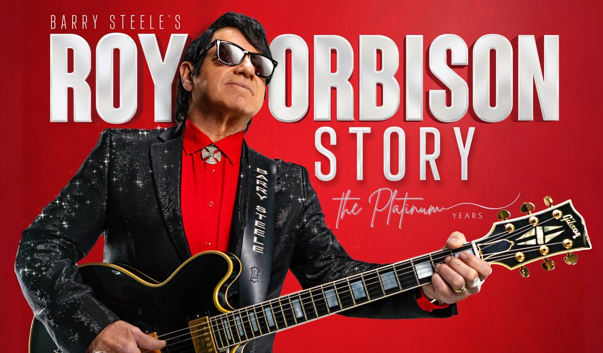 Red poster advertising the Roy Orbison Story at the Weston Playhouse. The poster features a guitarist looking like the singer Red poster advertising the Roy Orbison Story at the Weston Playhouse. The poster features a guitarist looking like the singer