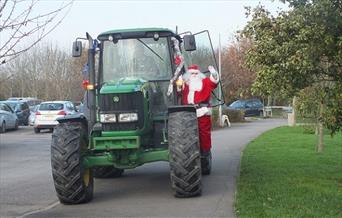 Santa Arrives by Tractor