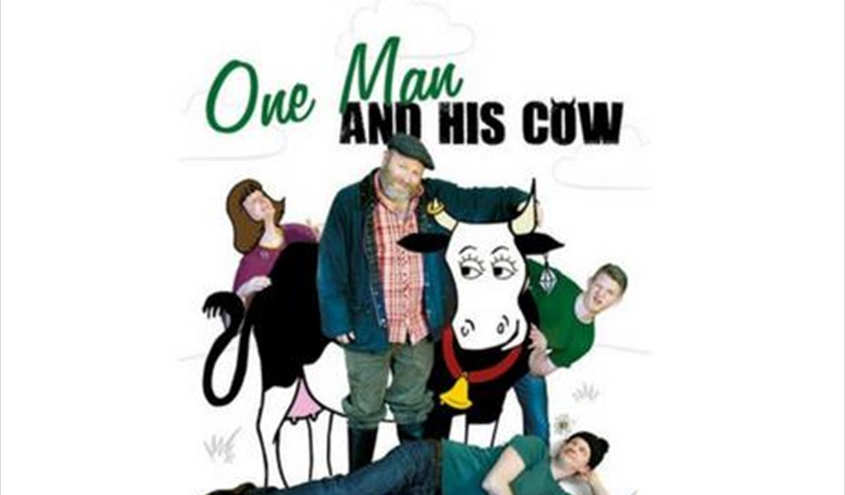 The actors cuddling a cartoon cow