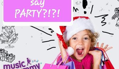 little girl with gifts excited about Christmas