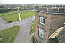 Exterior of Leasowe Castle with views of Leasowe Golf Course.