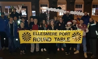Ellesmere Port Roundtable members holding banner