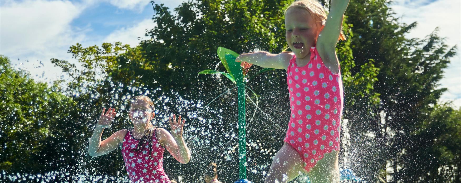 Kids playing in splash area at Drusillas park