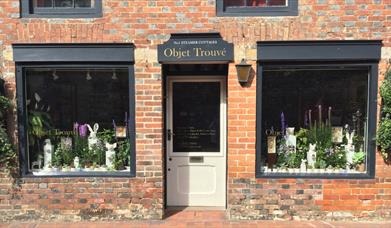 Shopfront of Objet Trouve, with windows either side