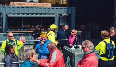 Cadence Cycle Hub cafe people drinking