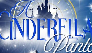 a poster for A Cinderella Panto, featuring the Disney castle in the background