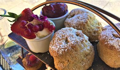 Scones Berries and raspberries and cream